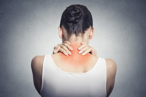 Woman with neck pain from fibromyalgia
